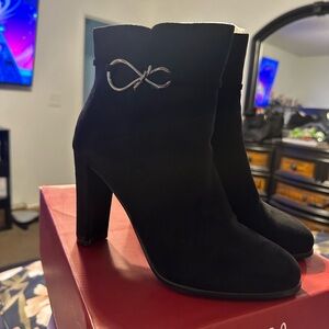 Elegant Black Ankle Boots with Silver Accent